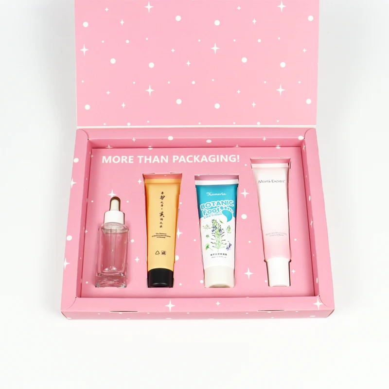 Open cosmetic gift box with fitted inserts